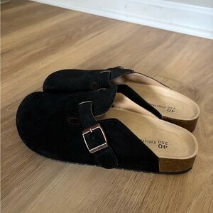 Women’s size 9
Black Suede Slip-On Clogs